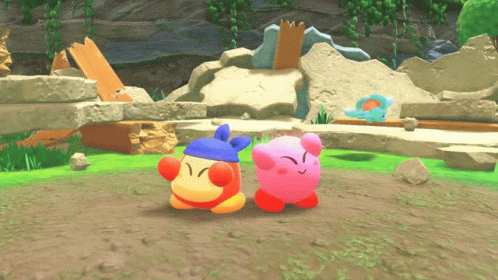 A Pink Kirby And A Red Kirby Are In A Video Game GIF