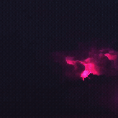 A Pink Lightning Bolt Is Coming Out Of A Cloud GIF