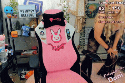 A Pink Meka Chair With A Bunny On The Back Sits In Front Of A Sign That Says Simps Welcome GIF