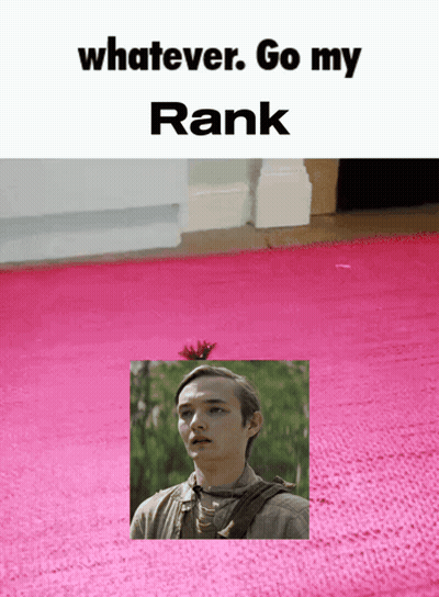 a pink rug with a picture of a man and the words " whatever go my rank " on top