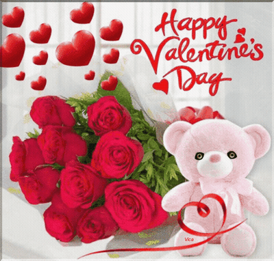 A Pink Teddy Bear Holding A Bouquet Of Red Roses Next To A Happy Valentine 'S Day Card GIF