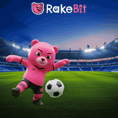 A Pink Teddy Bear Is Kicking A Soccer Ball In A Stadium With Rake Bit Written On The Bottom GIF