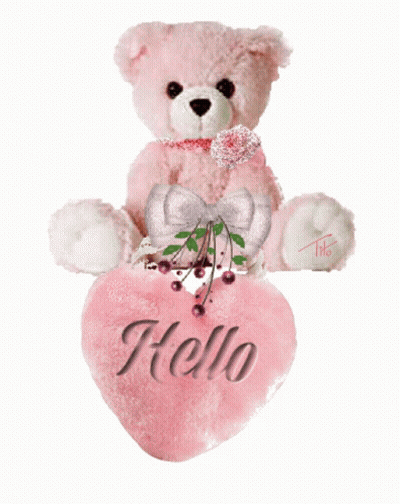 A Pink Teddy Bear Is Sitting Next To A Heart That Says Hello GIF