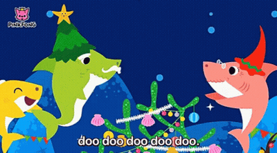A Pinkfong Video Shows Three Sharks Decorating A Tree GIF