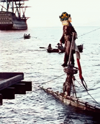 A Pirate Standing On A Raft In The Ocean GIF