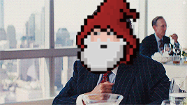 A Pixel Art Of A Man In A Suit With A Beard GIF
