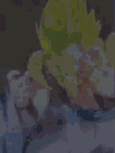 A Pixel Art Of A Person With Yellow Hair Holding A Piece Of Paper GIF