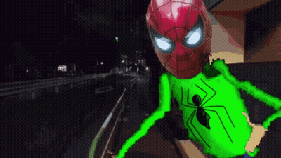 a pixel art of a spider man with a green spider on his chest