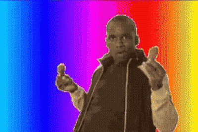 A Pixelated Image Of A Man Holding A Chicken Wing GIF