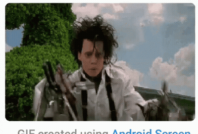 A Pixelated Image Of A Man Holding Scissors With The Words Gif Created Using Android Screen Below GIF