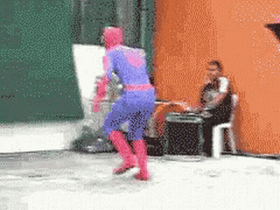 A Pixelated Image Of A Man In A Superhero Costume GIF