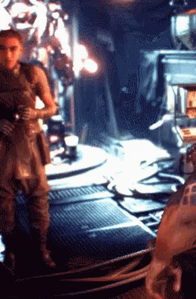 A Pixelated Image Of A Man Standing In A Room With The Letter F On His Arm GIF