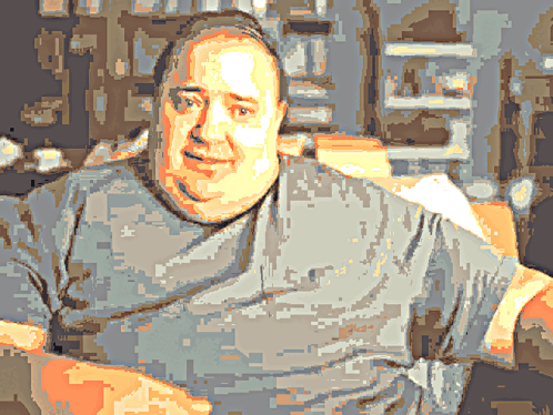 A Pixelated Image Of A Man Wearing A Grey Shirt With A White Star On It GIF