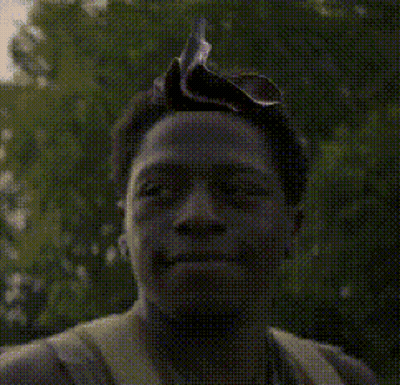 A Pixelated Image Of A Man Wearing A Headband GIF