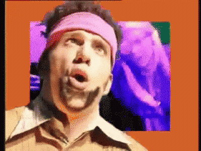 A Pixelated Image Of A Man With A Pink Headband GIF