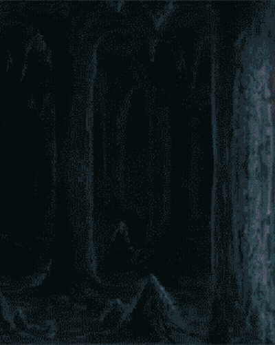 A Pixelated Image Of A Person With A Red Eye And The Letter N On The Bottom Right GIF