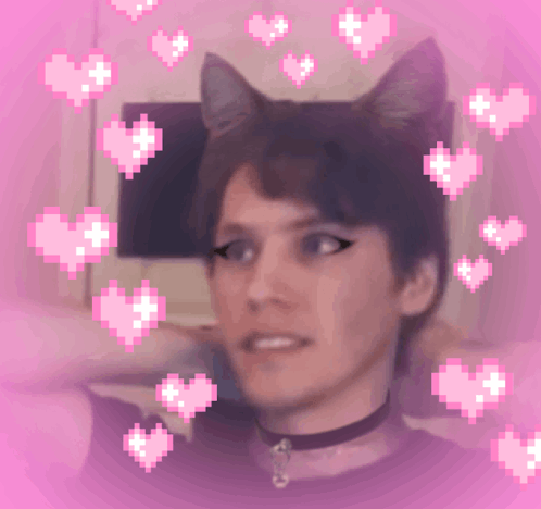 A Pixelated Image Of A Person With Cat Ears And Hearts Around Them GIF