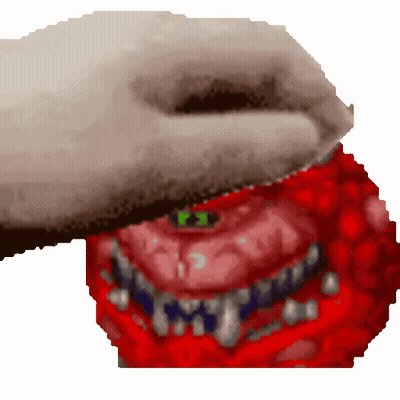 A Pixelated Image Of A Shark 'S Mouth With Sharp Teeth GIF