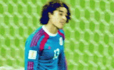 A Pixelated Image Of A Soccer Player With The Number 12 On His Shirt GIF