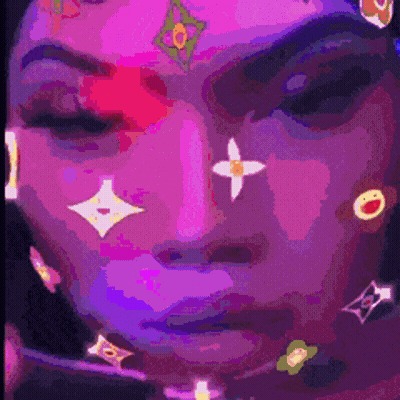 A Pixelated Image Of A Woman 'S Face With Louis Vuitton Logos On It GIF