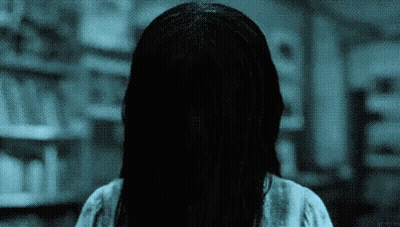 A Pixelated Image Of A Woman With Long Hair GIF