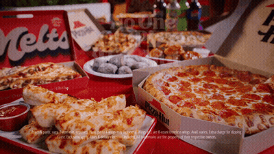A Pizza Hut Advertisement Shows A Variety Of Pizzas On A Table GIF