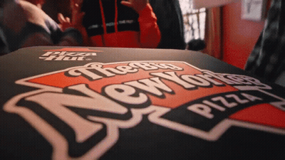 A Pizza Hut Box With The Big New York Pizza Logo On It GIF