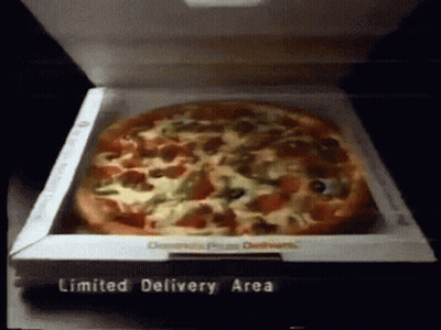 A Pizza In A Box That Says Limited Delivery Area On The Bottom GIF