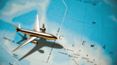 A Plane Is Flying Over A Map That Says Tropico Del Cinc GIF