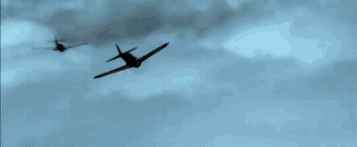 A Plane Is Flying Through A Blue Sky With A Few Clouds GIF
