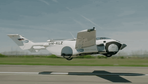 A Plane With The Letters Um-Klz On The Side GIF