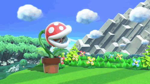 A Plant In A Pot With A Red And White Flower On Top GIF