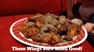 A Plate Of Chicken Wings With The Words " These Wings Sure Smell Good " On The Bottom GIF