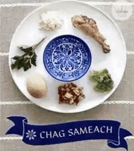 A Plate Of Food With A Banner That Says Chag Sameach On It GIF