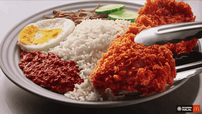 A Plate Of Food With A Mcdonald 'S Logo In The Corner GIF