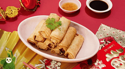 A Plate Of Food With Chopsticks And A Red Envelope That Says ' Fortune ' On It GIF