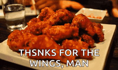 A Plate Of Fried Chicken Wings With The Words Thanks For The Wings Man GIF