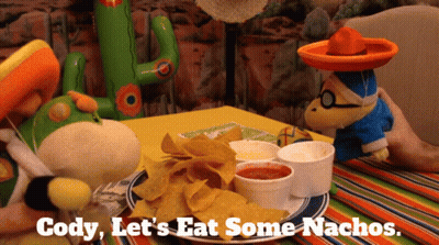 A Plate Of Nachos With The Words Cody Let 'S Eat Some Nachos Written On It GIF