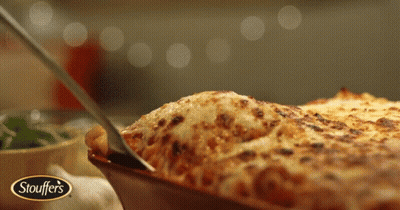 A Plate Of Stouffer 'S Lasagna Is Being Served GIF