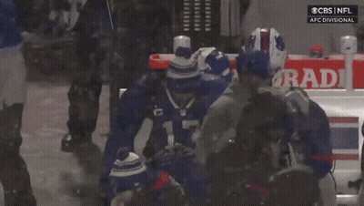 A Player With The Number 14 On Their Jersey Is Hugging Another Player GIF