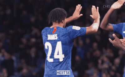 A Player With The Number 24 On Their Jersey Is Hugging Another Player GIF