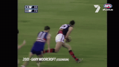 A Player With The Number 25 On Their Jersey Is Running With The Ball GIF