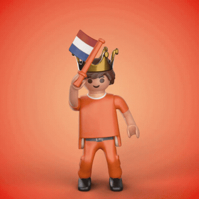 A Playmobil Figure Has A Crown On His Head And Holds A Flag GIF
