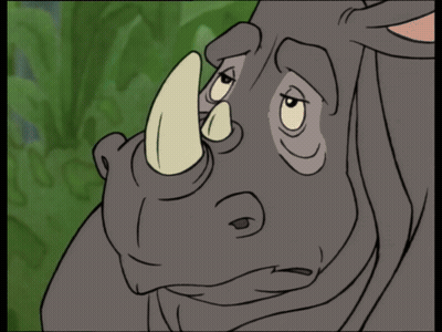 A Polar Bear Standing Next To A Rhino In A Cartoon GIF