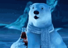 A Polar Bear Wearing A Scarf Is Holding A Bottle Of Coca Cola GIF