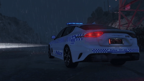 A Police Car With The Number 131 444 On The Side GIF