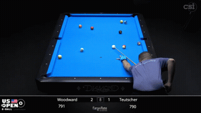 A Pool Table With A Blue Cloth And A Scoreboard That Says Us Open GIF