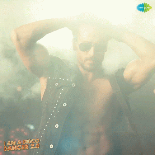 A Poster For A Movie Called I Am A Disco Dancer 2.0 Shows A Shirtless Man GIF