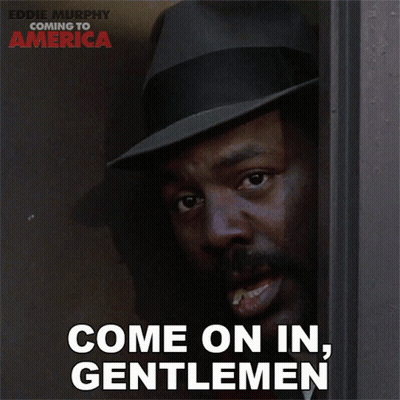 A Poster For Coming To America Shows A Man In A Hat Smiling GIF