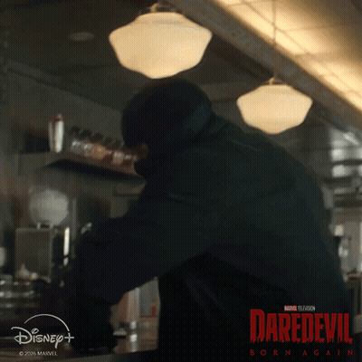 A Poster For Daredevil Born Again With A Man In A Mask GIF